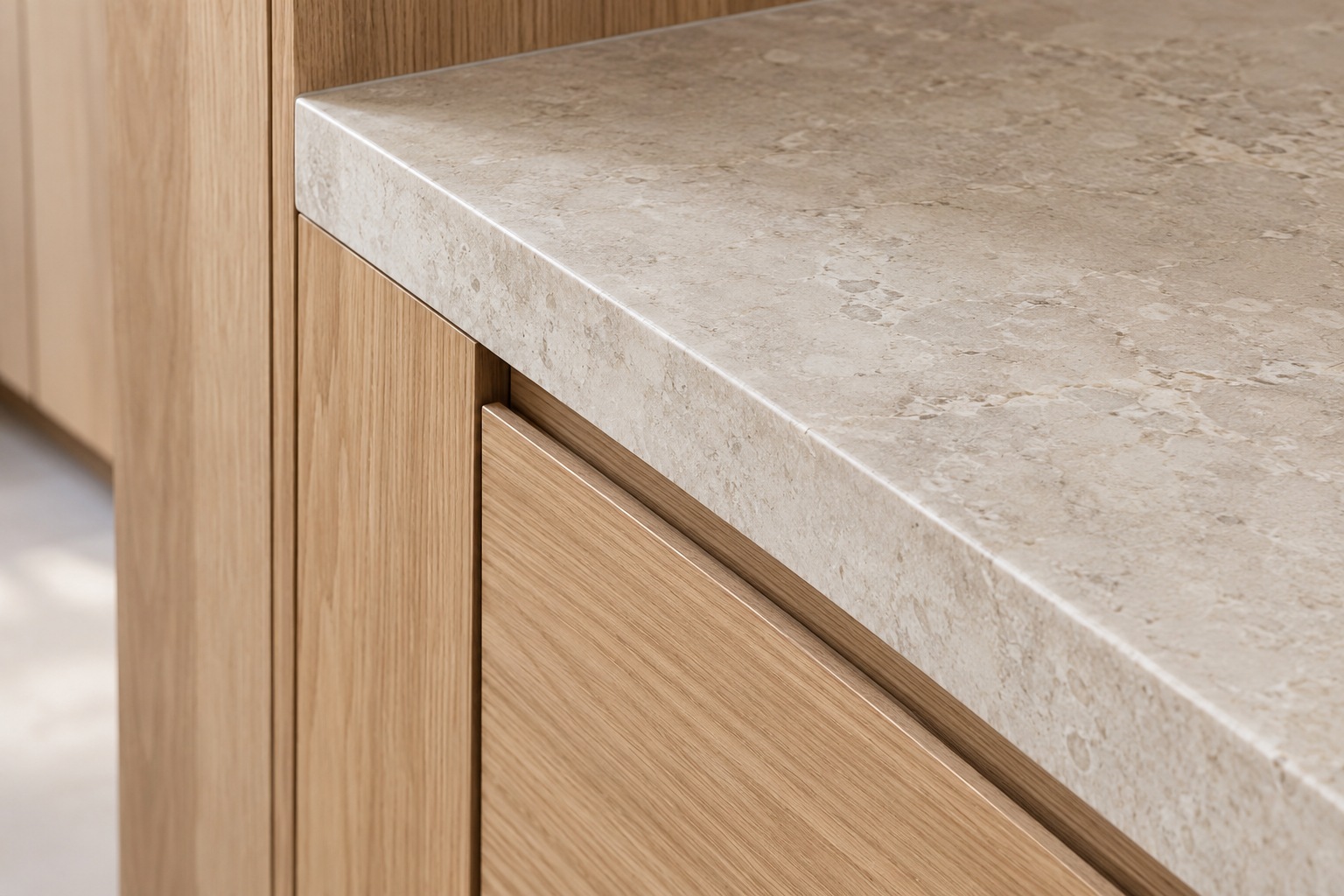 Close-up of honed stone and aligned timber cabinetry inspiration